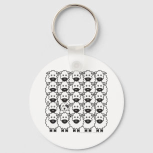 Llavero Perro pastor inglés viejo en las ovejas