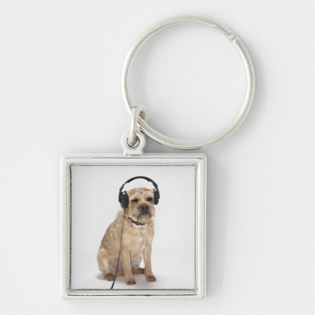 Llavero Perro pequeño con auriculares (Frente)