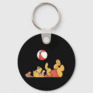 Llavero Perro que juega con las camisetas y los regalos de