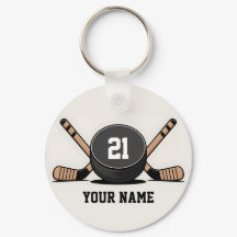 Llavero personalizado de disco y palos de hockey