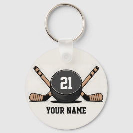 Llavero personalizado de disco y palos de hockey