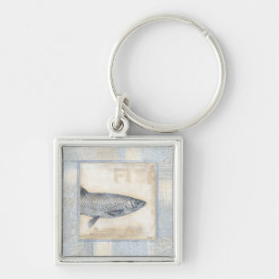 Llavero Pescado gris en fondo beige