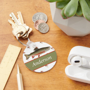 Llavero Pescadores Monogramados vuelan con trucha rota