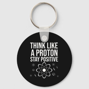 Llavero Piensen como un protón positivo