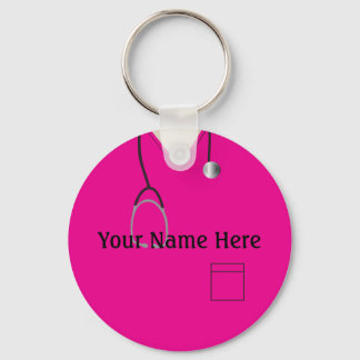 Llavero Pin con uniforme rosa de enfermera.