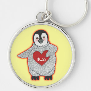 Llavero Pingüino con los abrazos del corazón