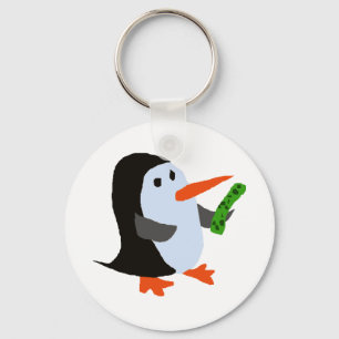 Llavero Pingüino gracioso con una camiseta de rosca