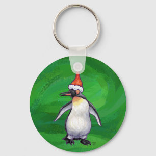 Llavero Pingüino lindo con sombrero de Santa en verde