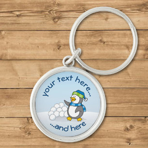 Llavero Pingüino pequeño con bolas de nieve ondeando