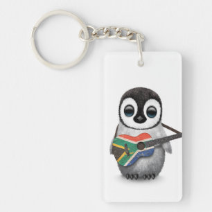 Llavero Pingüino que toca la guitarra surafricana de la