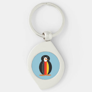 Llavero Pingüino vestido con la bandera del arcoíris del O