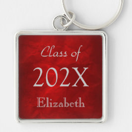 Llavero Plata sobre graduación roja