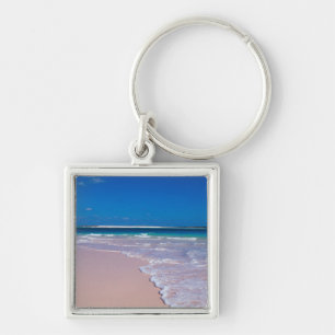 Llavero Playa de arena rosa en Conch Bay, Isla del Gato,