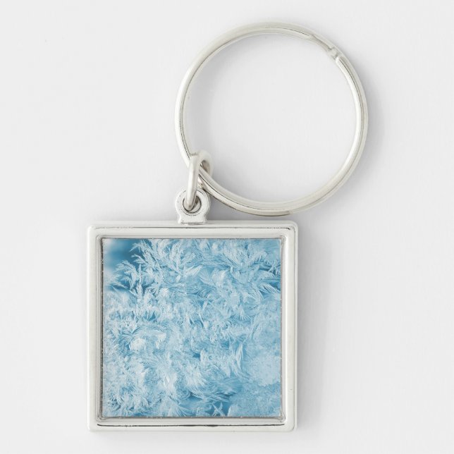 Llavero plumas azules abstractas y copos de nieve (Frente)