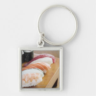 Llavero Primer del sushi en una tabla