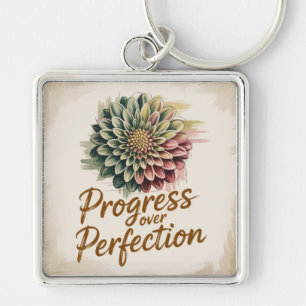 Llavero Progreso Sobre Perfección