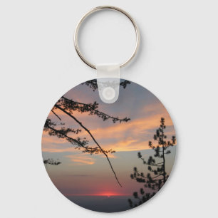 Llavero Puesta del sol rosada con el árbol y las nubes de