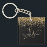 Llavero Purpurina dorado Glam Monograma Nombre<br><div class="desc">Purpurina Glam Gold Elegant Monogram Name Keychain Fácilmente personaliza este moderno diseño de cadena de teclas de moda con un elegante purpurina brillante de oro sobre un fondo negro. El diseño incluye su monograma manuscrito con giros de bonito y nombre.</div>