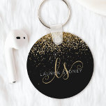 Llavero Purpurina dorado Glam Monograma Nombre<br><div class="desc">Purpurina Glam Gold Elegant Monogram Keychain,  Fácilmente personaliza este diseño de moda de la cadena de moda con un elegante purpurina brillante de oro sobre un fondo negro. El diseño incluye su monograma manuscrito con remolques de bonito y su nombre.</div>