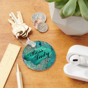 Llavero Purpurinoso Aqua Paint sorprende al Jefe Lady