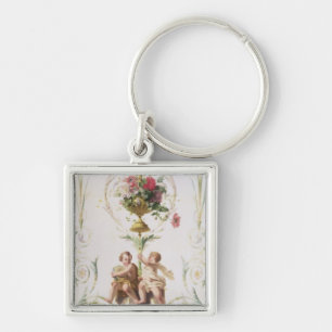 Llavero Putti en medio de swags de flores y de hojas