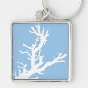 Llavero Rama de coral - blanco sobre azul pálido