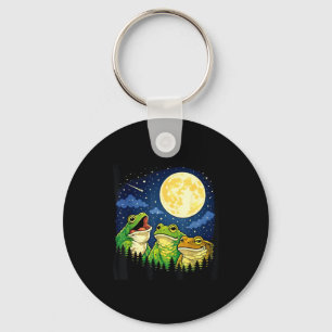 Llavero Ranas aullando meme luna montañas pinos naturaleza