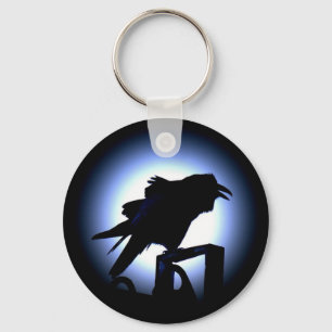 Llavero Raven Silhouette contra la luna llena