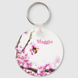 Llavero Redbud y abeja de miel en primavera