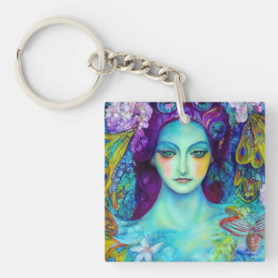 Llavero Reina de hadas encantada con mariposas