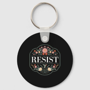 Llavero Resistir la protesta floral contra Trump _2