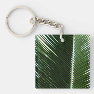 Llavero Resumen verde tropical de palmeras que se abruman