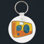 Llavero Retro Yellow Point and Shoot Film Camera<br><div class="desc">Keep your passion for photography close at hand with this retro yellow point and shoot camera keychain. This small but vibrant accessory features a stylized cartoon film camera in bright orange and yellow colors, making it easy to find your keys in any bag. It is a perfect stocking stuffer or...</div>