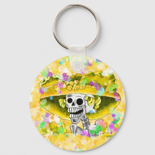 Llavero Ríe mujer esquelética en bonnet amarillo