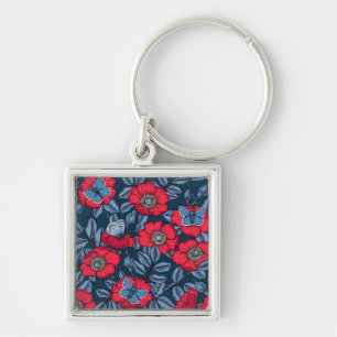 Llavero Rosa de perro y mariposas en azul y rojo