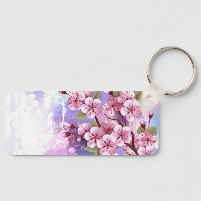 Llavero Sakura rosa sobre fondo de pintura (Anverso)