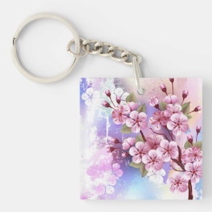 Llavero Sakura rosa sobre fondo de pintura