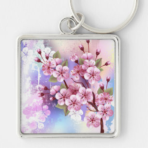 Llavero Sakura rosa sobre fondo de pintura
