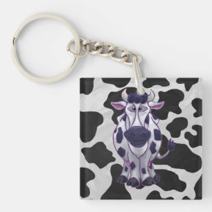 Llavero Salvaje de vaca negro y blanco