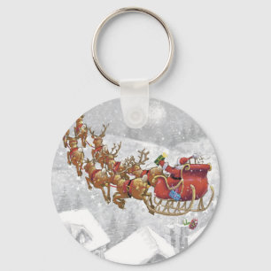 Llavero Santa Claus en trineo con caja de regalo