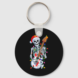 Llavero Santa Claus esqueleto rockero navideño mano rock n