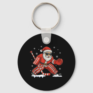 Llavero Santa jugando portero de hockey sobre hielo Navida