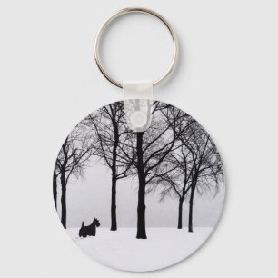 Llavero Scottie en bosques nevados