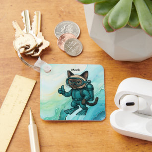 Llavero Scuba Cat se está sumergiendo bajo el agua