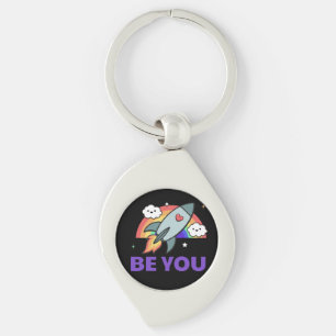 Llavero Sé tú. Nube de cohetes arco iris con corazón Keych