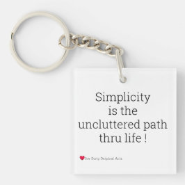 Llavero Sencillez negro en la cadena de claves blanca