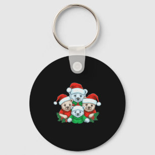 Llavero Sentado en la nieve con los Navidades de la Luz Sa