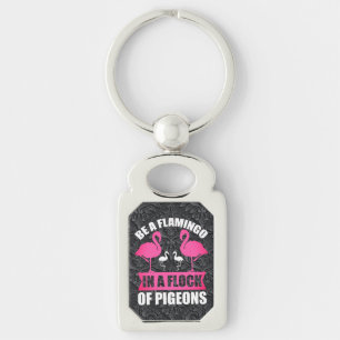 Llavero Ser Un Flamenco En Una Bandada De Palomas