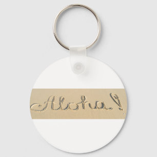 Llavero Signo de palabra Aloha en la arena de la playa