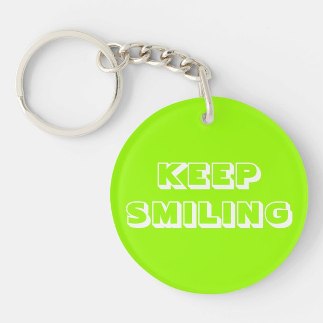 Llavero Sigue sonriendo, con caracter verde blanco (Frente)
